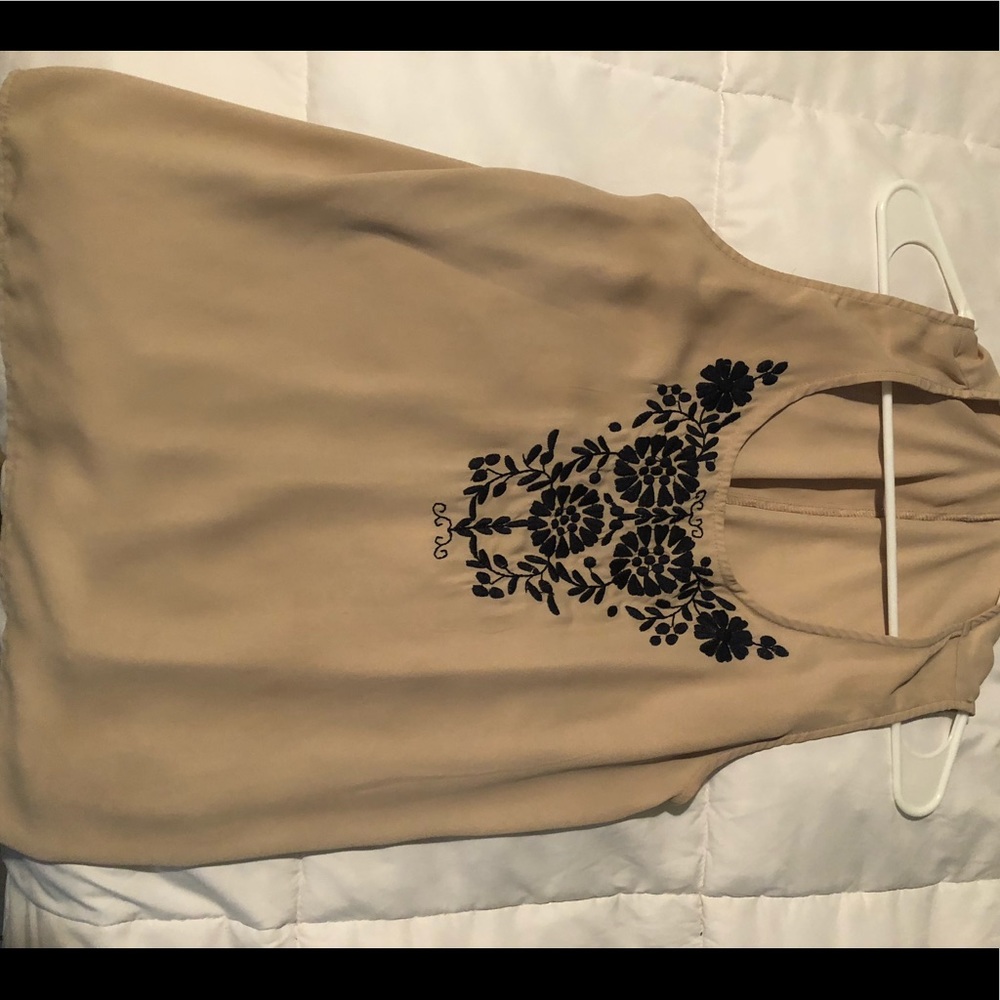 Tan tank with detailed stitch work